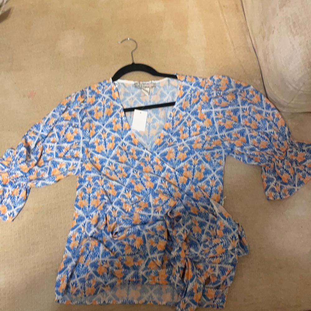 Wrap around blouse. Brand new